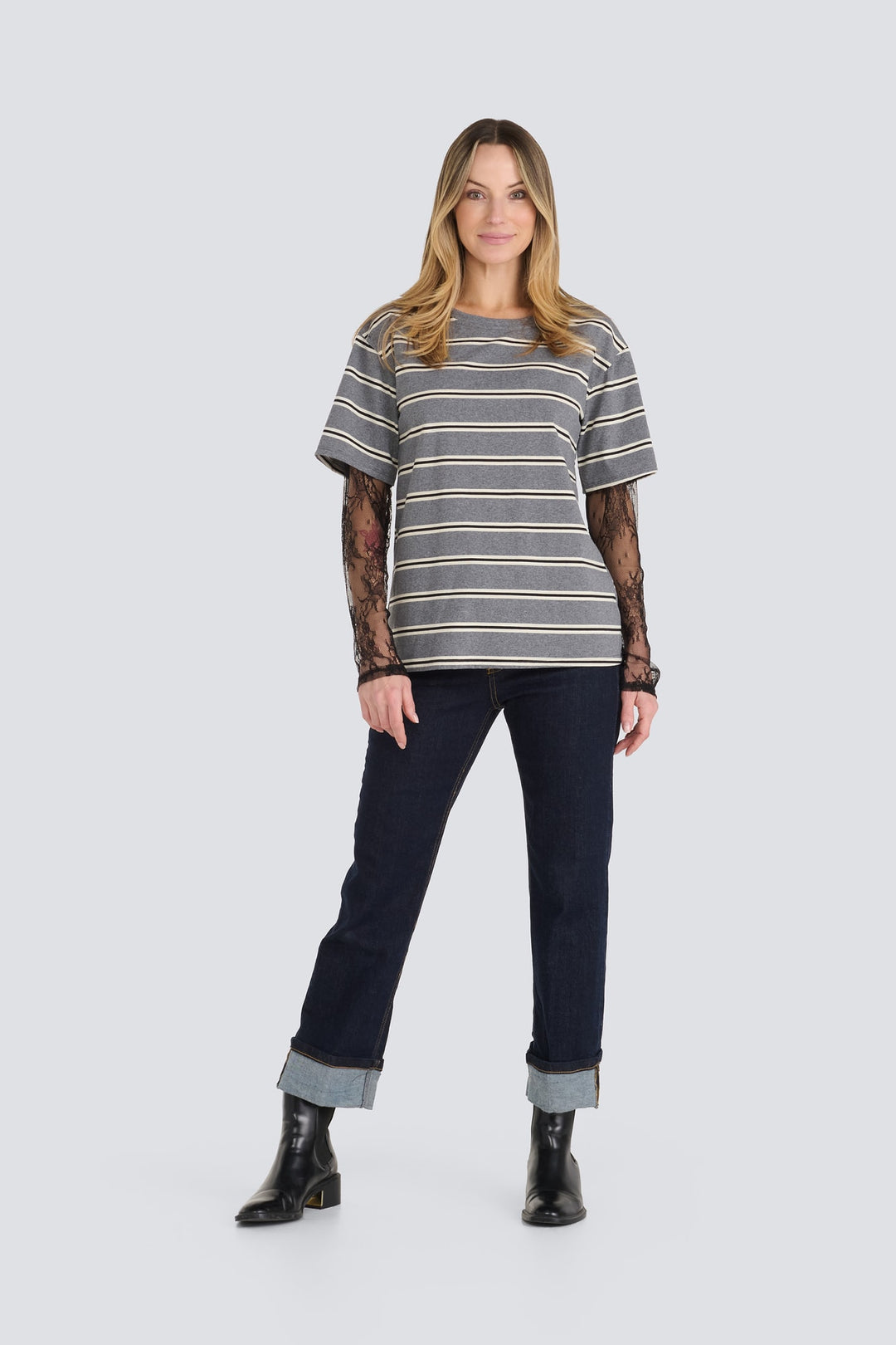 Grey horizontal striped t-shirt with sheer black lace long sleeves.