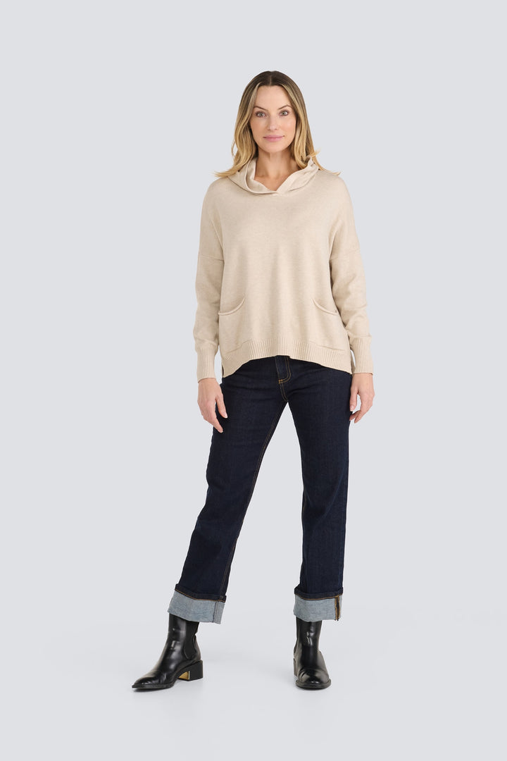 Dark wash straight-leg denim jeans with wide cuffed hems and contrast stitching.