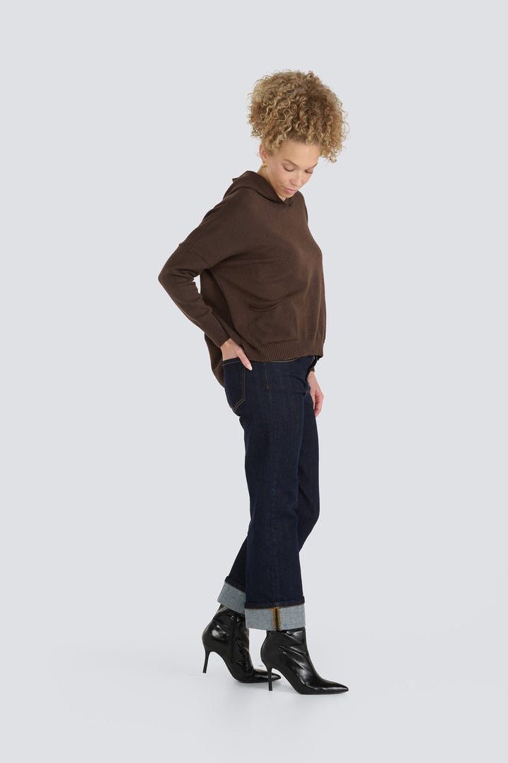 Brown knit hooded sweater with long sleeves and ribbed trim.