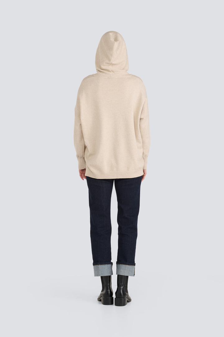Light beige knit hooded sweater shown from the back.