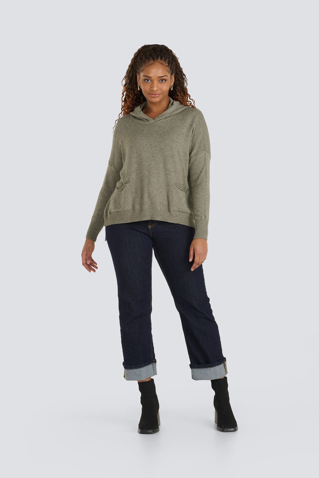 Olive green knit hooded sweater featuring long sleeves, front pockets, and ribbed hem.