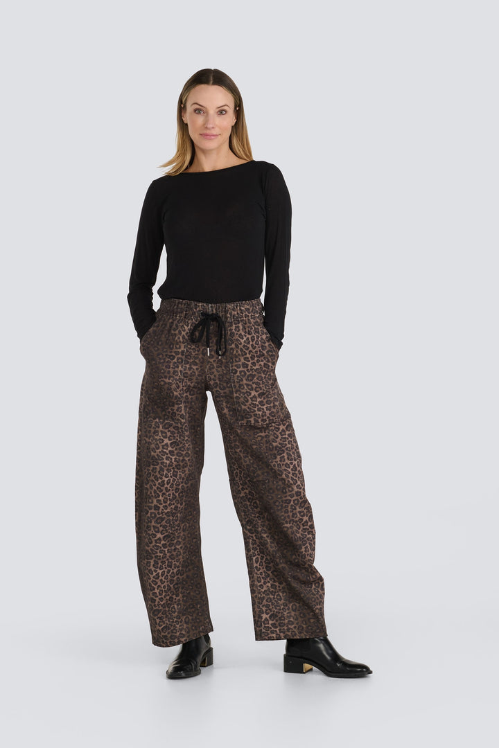 Brown leopard print wide-leg pants featuring a black drawstring waist.