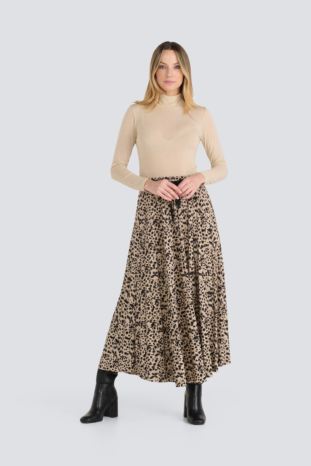 Pleated tan and black leopard print midi skirt with a black waist tie.