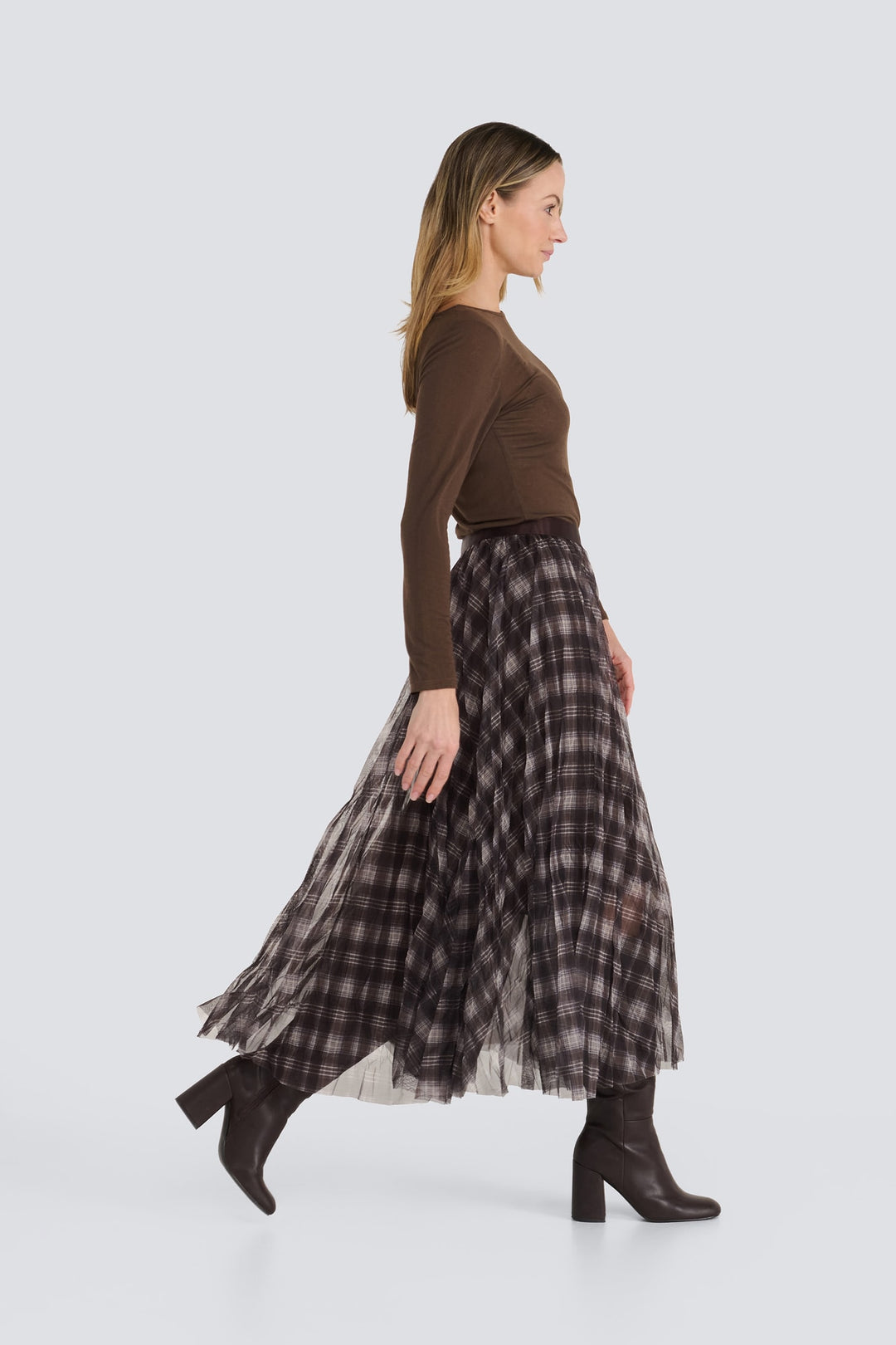 Brown long-sleeve top paired with a brown plaid pleated mesh midi skirt.