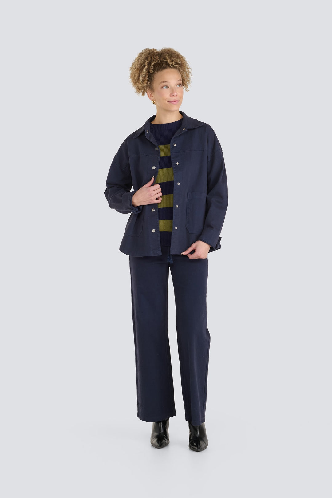Dark navy blue button-front jacket with matching wide-leg trousers.