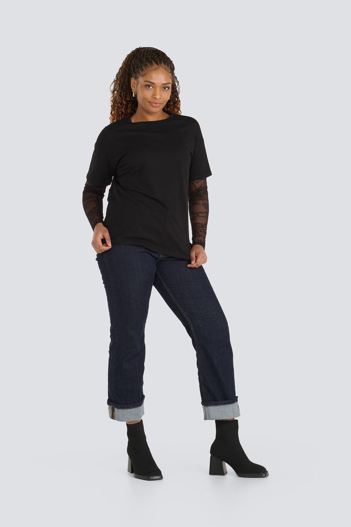 Black short-sleeve top featuring layered sheer lace long sleeves.